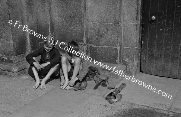 BOYS AT KINGSBRIDGE DRYING FEET